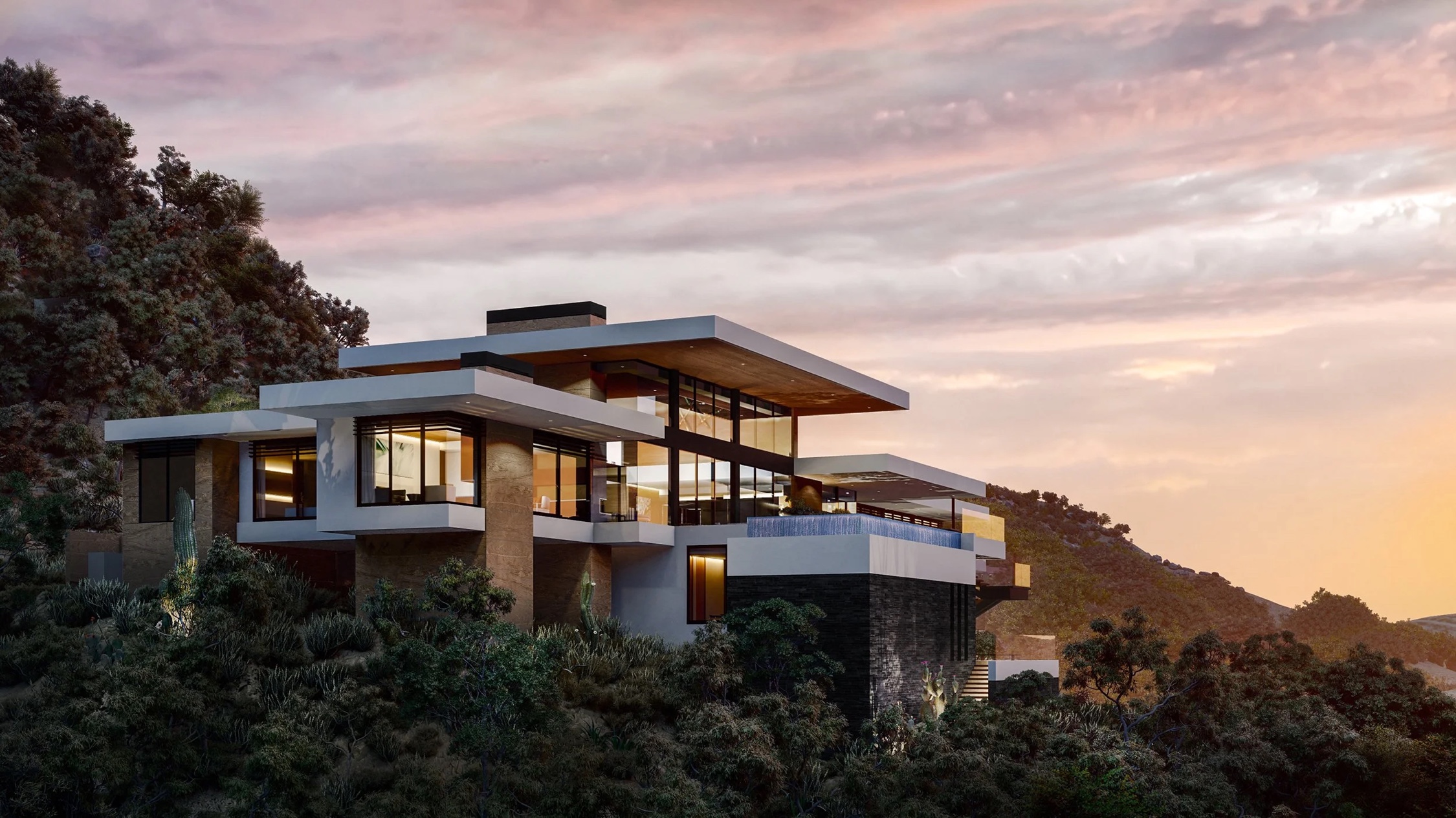 Luxury modern hillside home at sunset